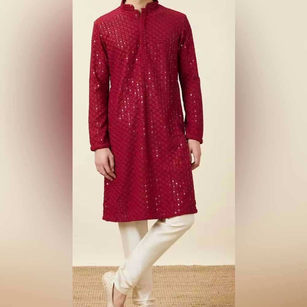 Men's chikankari Kurta and White Pyjama Set.